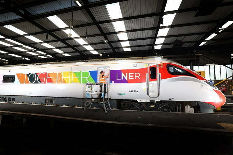 LNER Azuma train being decorated in new livery to celebrate PRIDE. 