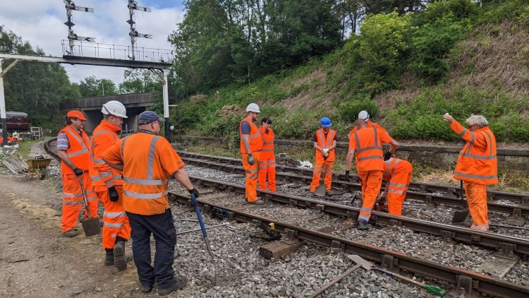 Team from Network Rail being given briefing from East Lancashire Railway maintenance team