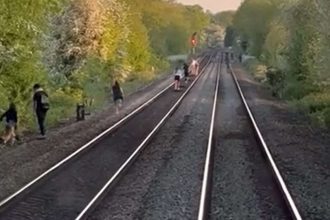 Shocking footage released of children playing on the railway