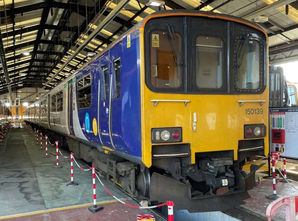 Class 150s from Northern, which are yet to receive their LNWR branding, at Bletchley Depot