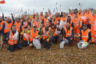 Rail workers help Marine Conservation Society to clean Brighton & Hove Beach