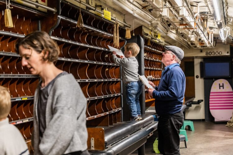 Sorting mail in the travelling post office at The Engine House Visitor Centre // Credit: SVR