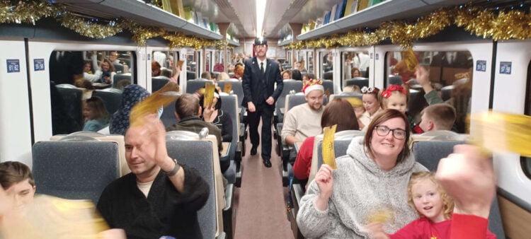 Ukrainian children and their host families enjoying the Mid Norfolk Railway's Polar Express. // Credit: Mid Norfolk Railway