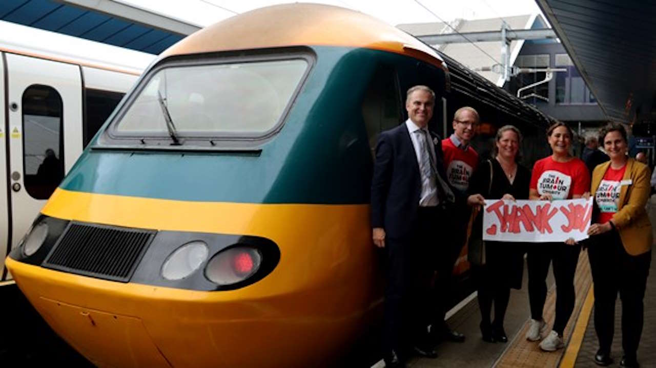 CrossCountry's Tom Joyner, Modern Railways' Philip Sherratt, Department for Transport's Fiona White, The Brain Tumour Charity's Hannah Bowler and CrossCountry's Joanna Davey with CrossCountry's final HST service at Reading, Tuesday 26 September 2023