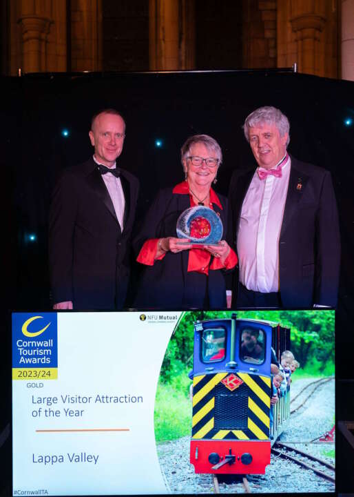 Keith and Sara Southwell, owners of Lappa Valley accepting the gold award for large visitor attraction of the year from headline sponsor NFU Mutual