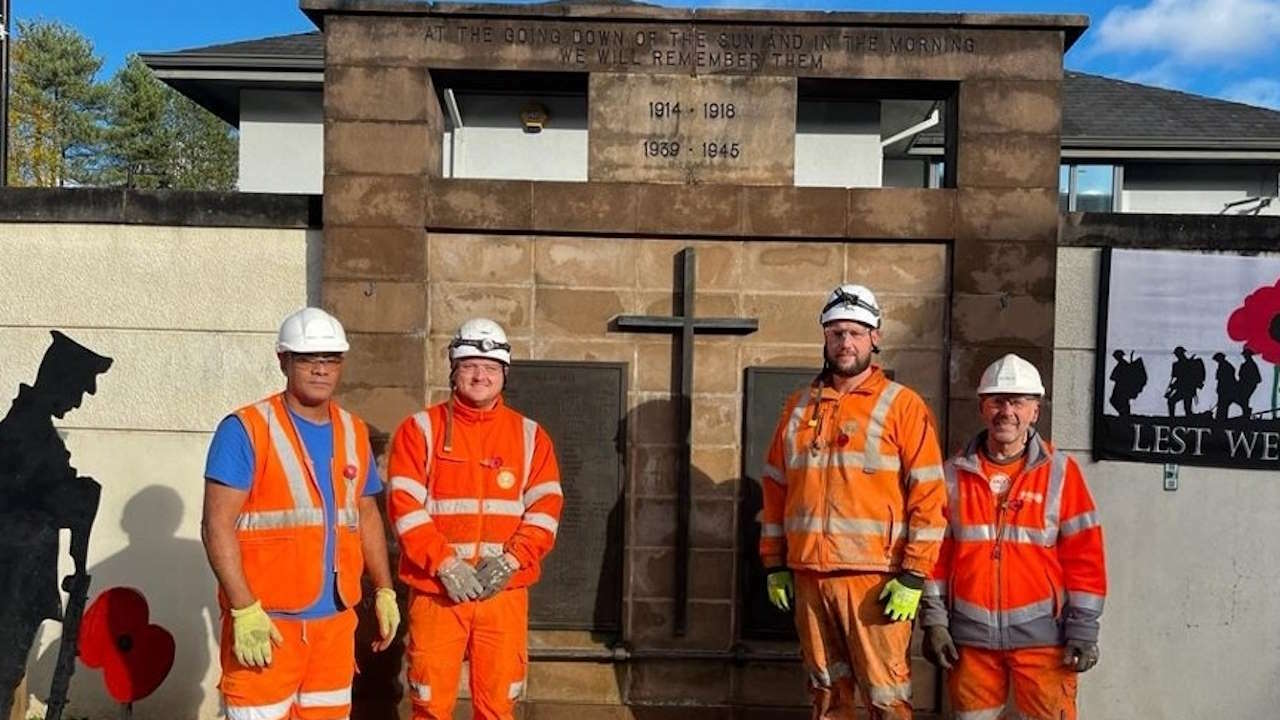 Members of the railway team working to restore the war memorials