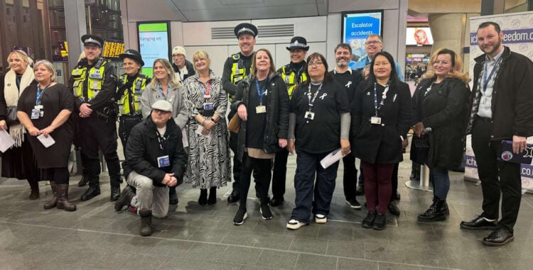 Southeastern's Trax choir with members of British Transport Police. // Credit: Southeastern