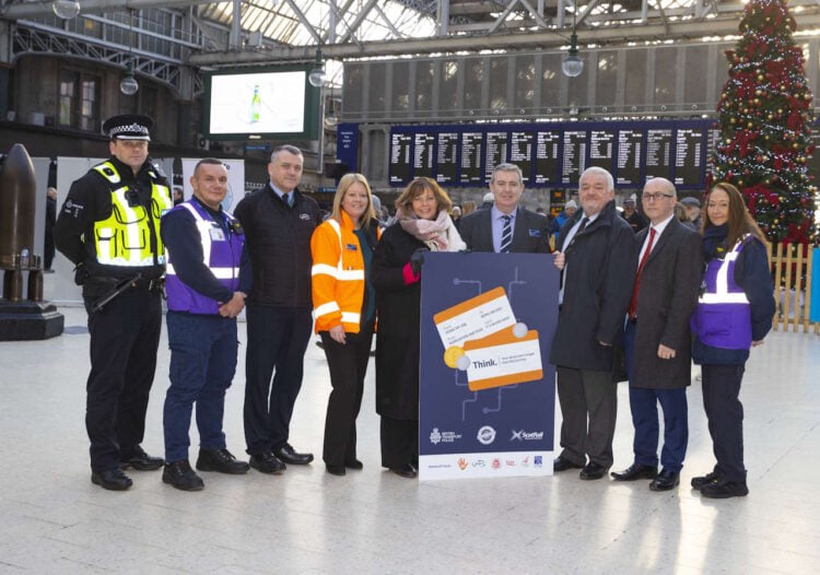 (l-r): Chief Inspector Chris Shields, British Transport Police; Joshua Edwards, ScotRail Travel Safe Team; John Hay, RMT; Margaret Hoey, ScotRail; Fiona Hyslop MSP, Transport Minister; Phil Campbell, ScotRail Customer Operations Director; Jim Walsh, ASLEF; Gary Kelly, TSSA; Audrey Lowrie, ScotRail Travel Safe Team. // Credit: Alan Harvey / SNS Group