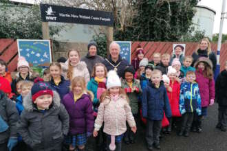 Path from Lancashire station to wildlife site framed by new archway