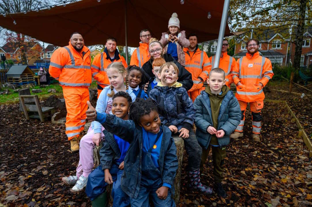 Pupils with BBV and SIG volunteers in the new Forest School at Paget Primary School