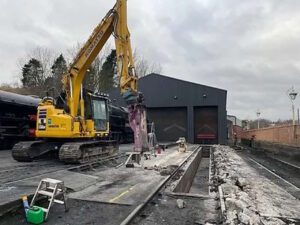 Breaking up concrete alongside the pit on road 2 on 10 January.