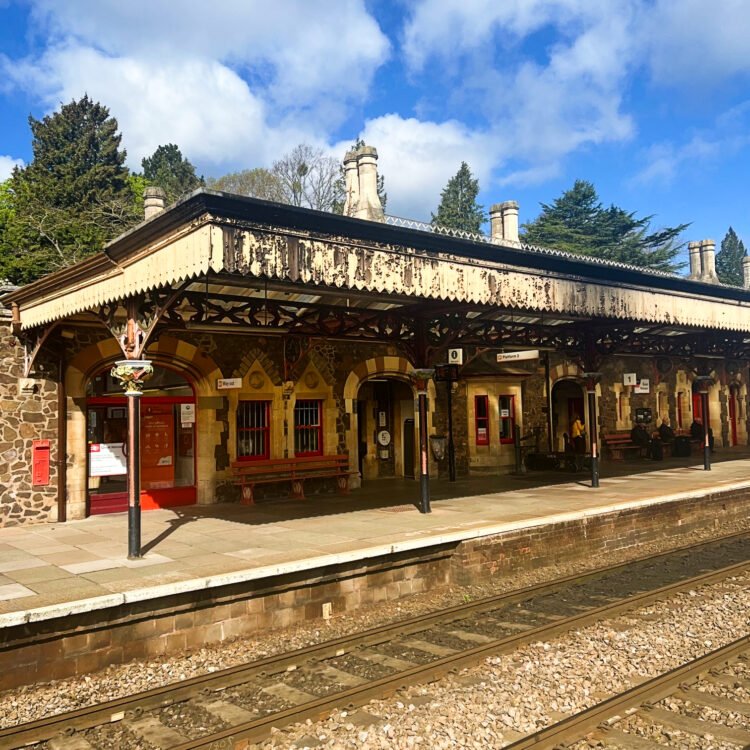 Great Malvern Station prior to the canopy restoration. The picture shows shabby unpainted facia and canopy supports