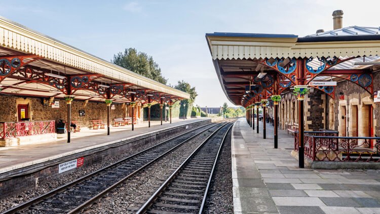 This picture shows the platforms at Great Malvern Station with the platform canopies restored. The pillars are cast iron with intricate designs and colourfully painted, 