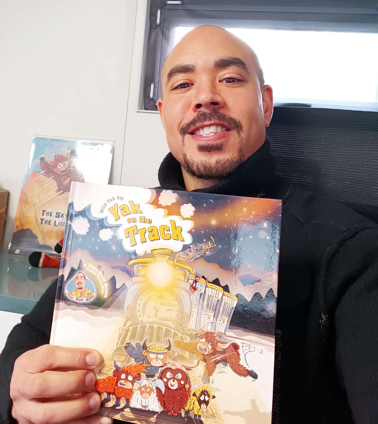 Uncle Brow Brows with his latest railway-themed children's book