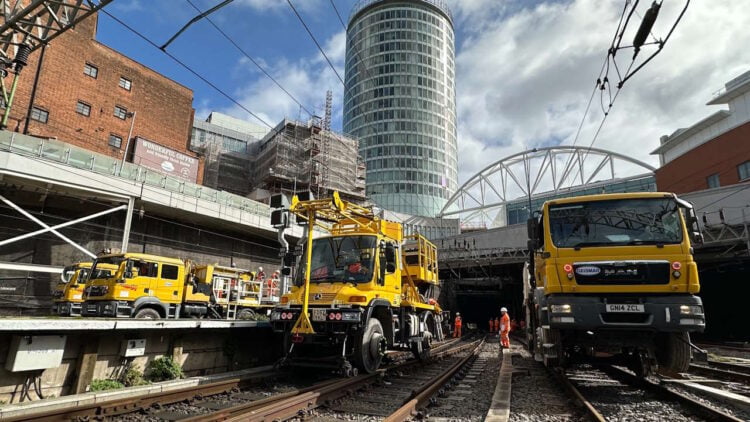 Network Rail maintaining overhead lines at Birmingham New Street station_