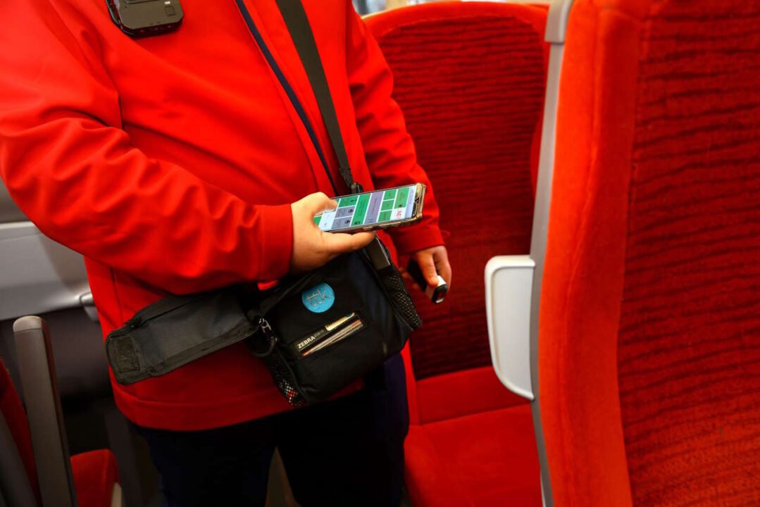 London North Eastern Railway conductor checking tickets. // Credit: London North Eastern Railway