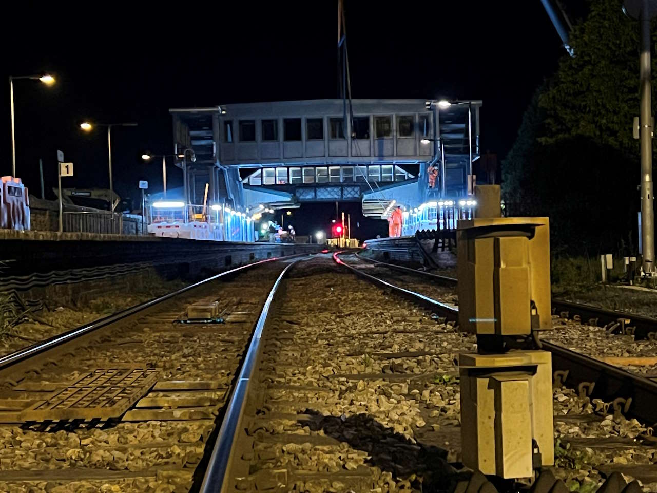 Bridge span is installed at Llanelli station as part of construction of accessible footbridge