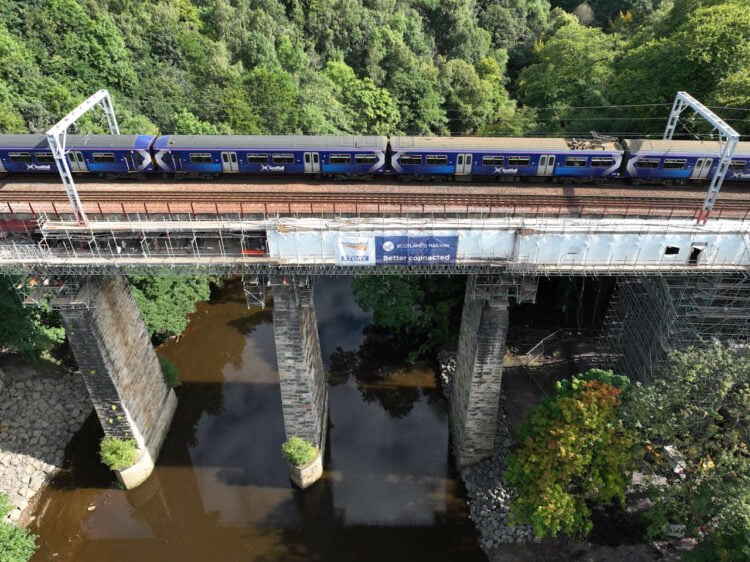 Train crossing Camps Viaduct. // Credit: Network Rail