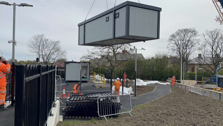 picture of a cabin being lowered into place