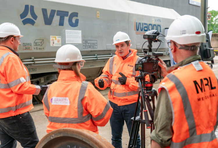 Rail Minister Huw Merriman being interviewed in front of the VTG iWagon. // Credit: VTG