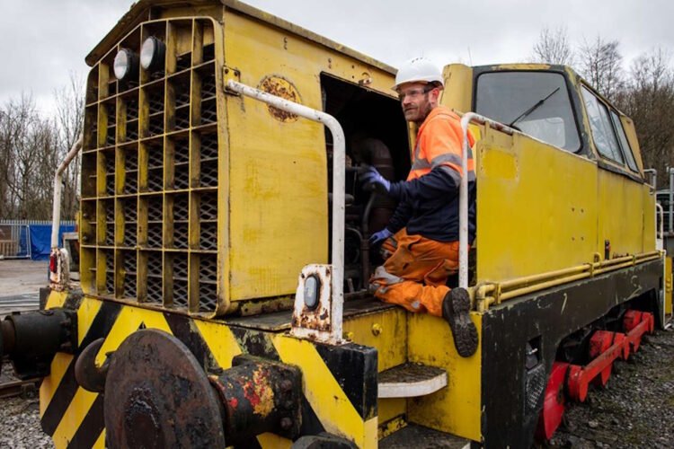 Rob Williamson, Mechanical Engineering Manager at Wensleydale Railway PLC, inspects the locomotive at the Hope Cement Works site. // Credit: Hope Cement Works