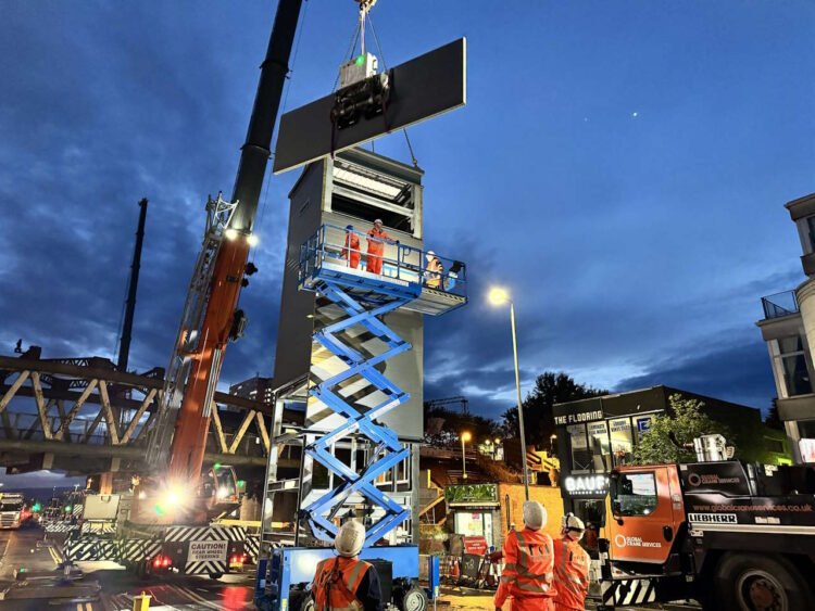 Lifting some of the steelwork of the lift towers at Anniesland railway station. // Credit: Network Rail