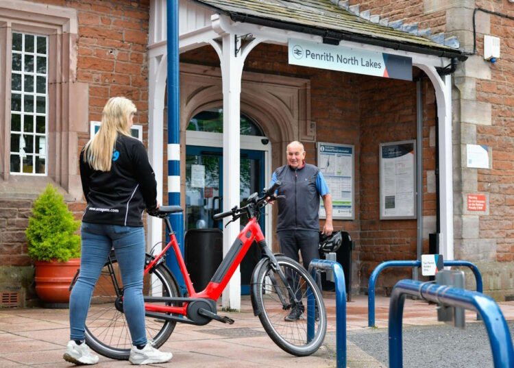 Visitor collecting his e-bike at Penrith station. // Credit: Stuart Walker/Avanti West Coast