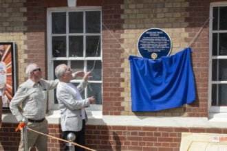 Lord Hendy unveils plaque to mark North London station’s 150 anniversary