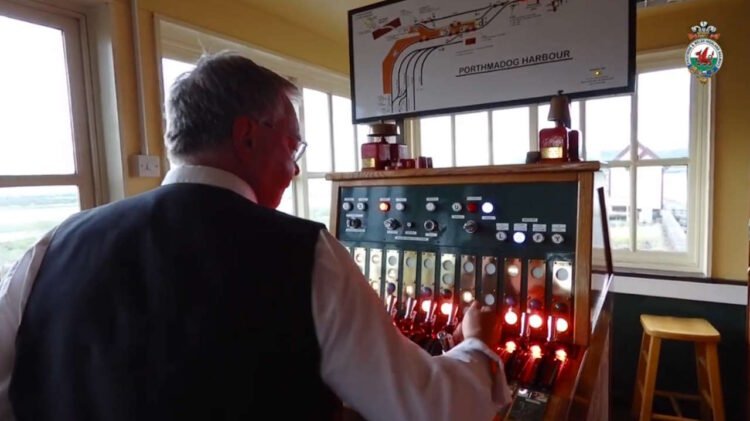 Jazz musician Ted Beausire at work in Porthmadog Harbour signal box. Credit: Ffestiniog and Welsh  Railways