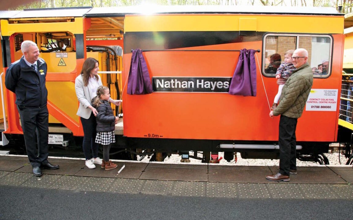 Nathan’s wife, Lucy, daughters Emily & Alice and father, Derek unveiled the nameplate. // Credit: Alex Hall/Rail Infrastructure Magazine