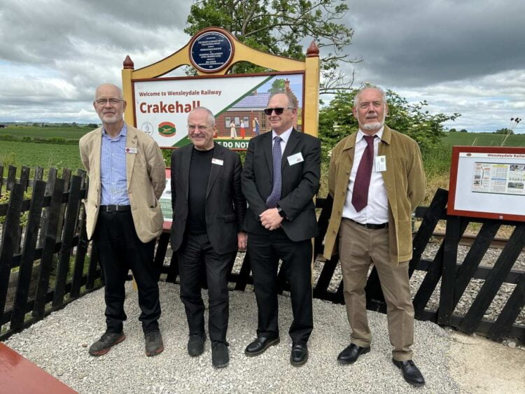 Left to right: Andy Savage (Chair of Railway Heritage Trust), Lord Hendy (Chair of Network Rail), Bob Coombs and David Walker (Trustee of Wensleydale Railway Association (Trust) and Director of Wensleydale Railway PLC) - Nick Keegan, Wensleydale Railway