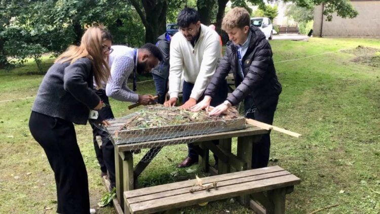 Northern employees creating a bug hotel - Northern