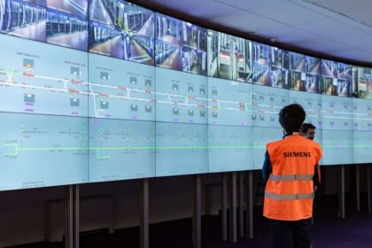 Person Looks at cctv and signalling diagram
