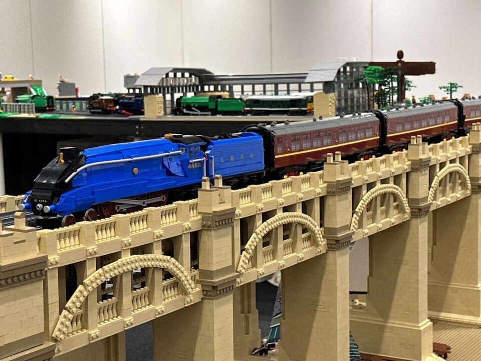 4468 'Mallard' crossing a LEGO viaduct. // Credit: LEGO UK Railway