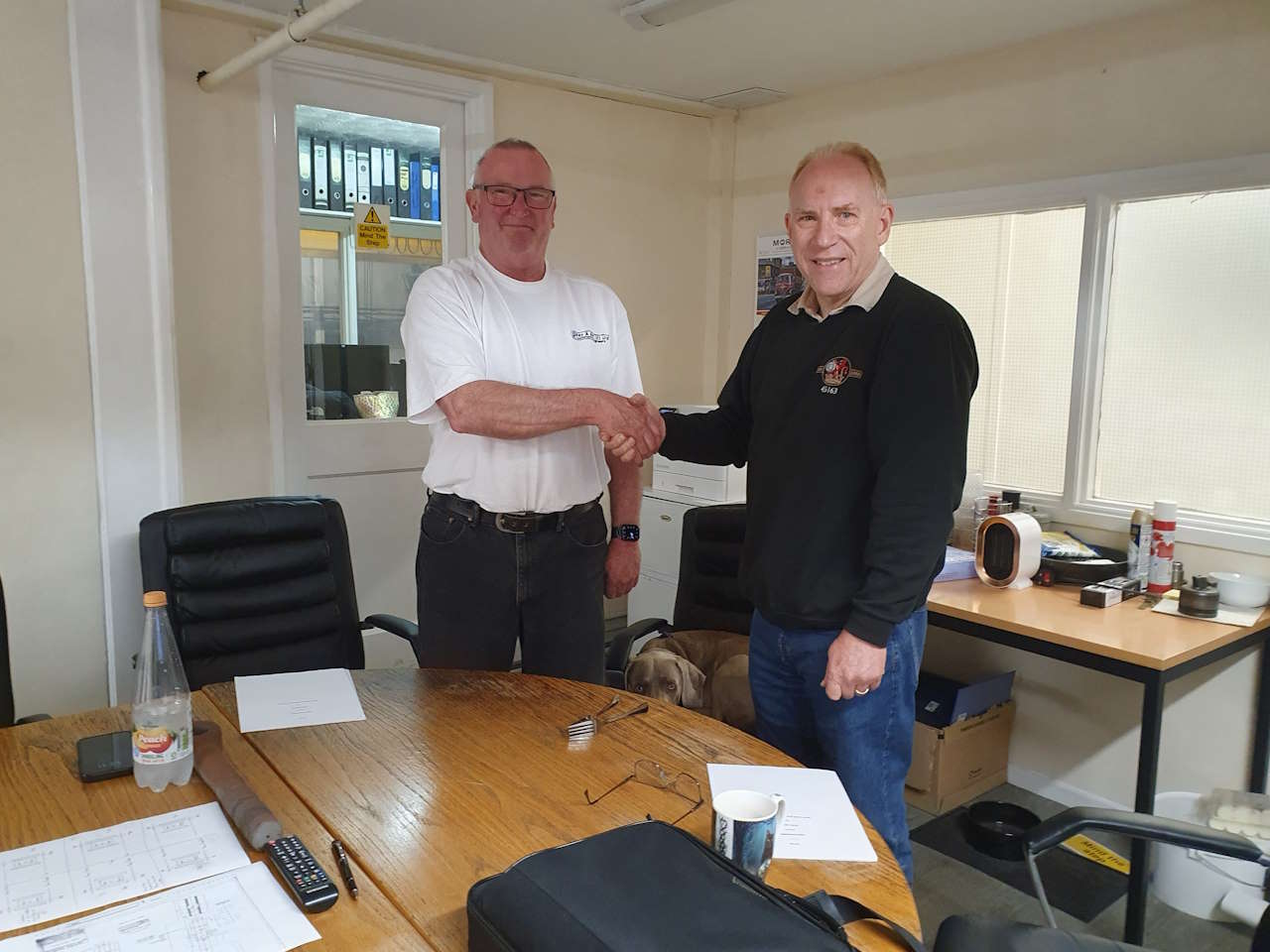 Ian Riley shaking hands with 45163 Ltd Chairman, Jeremy Dunn on July 4th 2024 upon signing of the formal agreement between the two parties