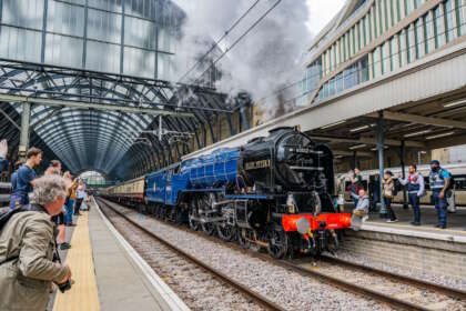 A re-dedication ceremony took place at London Kings Cross station on 13 July to mark the long awaited return to mainline steam. The locomotive was rescued from the scrap line in 1968 by Geoff Drury and has now returned into perfect working order. 60532 Blue Peter Departs Kings Cross Station with a private train bound for York.