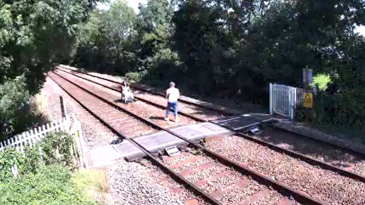 A photoshoot on the railway line at Chestnut Grove level crossing