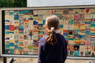 Tile artwork created by pupils unveiled at Prestbury Station