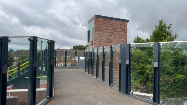 New glazed barriers on Garforth station footbridge