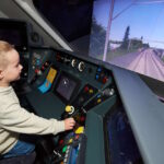 Five-year-old Daniel Rogerson at a Pendolino training simulator. // Credit: five-year-old Daniel Rogerson