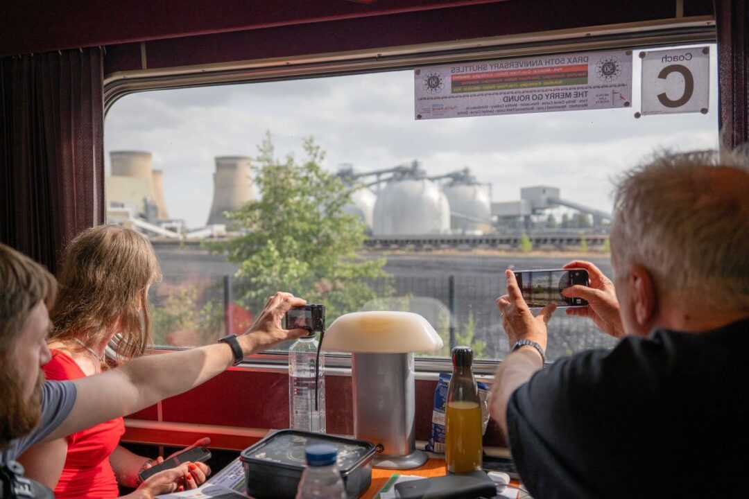 Passengers onboard the charter train as it passes DPS - Drax Power Station