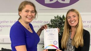 Waterloo Station Manager Emily Haggard and Laura Kopelciw, Project Manager for Stations, with the Autism Friendly Accreditation certificate - Network Rail