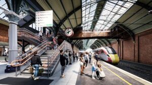 What could be a every day sight. a CGI impression looking down Platform 1 showing the new staircase and footbridge with original historic clock at Darlington - Network Rail