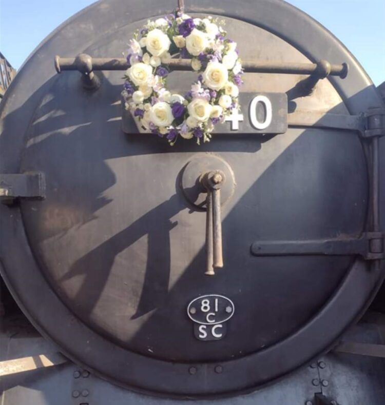 A wreath in memory of Tom adorns 92240 - Ken Upton