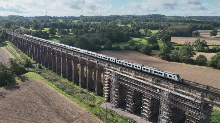 Aerial view of Ouse Valley Viaduct carrying a Thameslink train