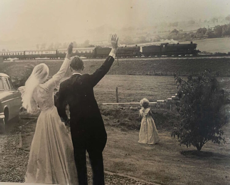 George and Margaret Stone waving at a stem train // Credit: Great Western Railway