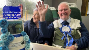 George and Margaret Stone waving at a stem train // Credit: Great Western Railway