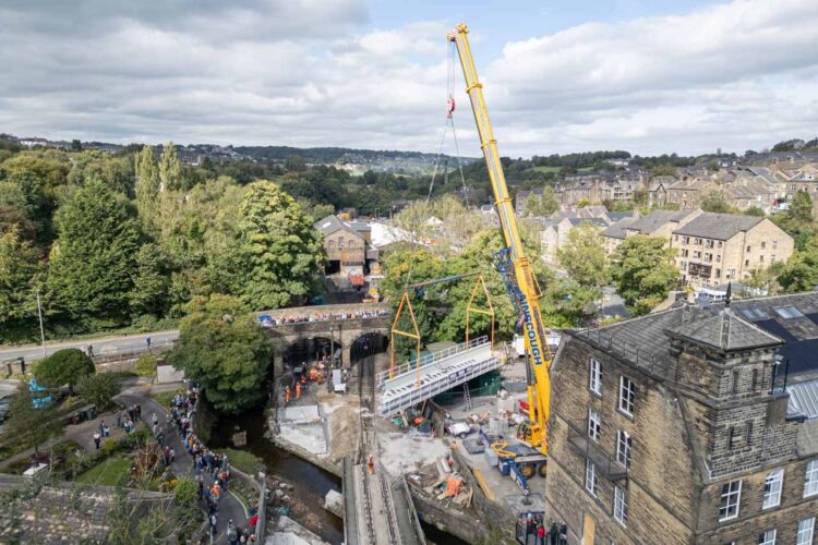 New bridge deck being lifted into position - KWVR