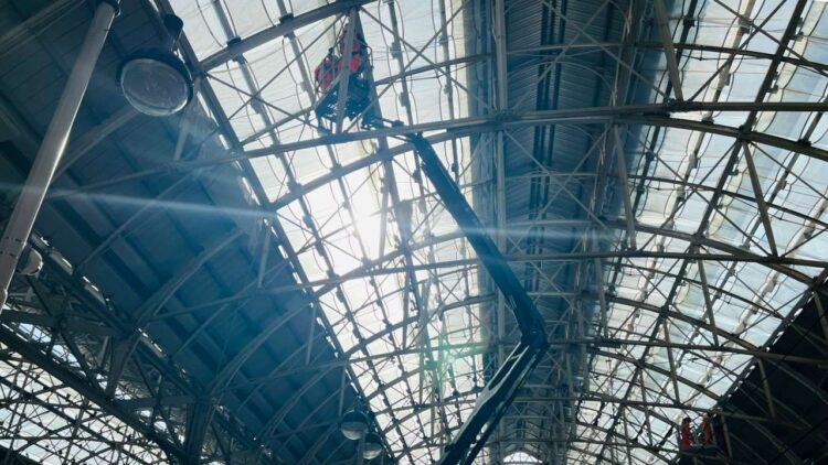 Safety netting being installed below the roof at Manchester Piccadilly - Network Rail