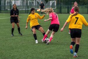 Surekha Griffiths referees a girl’s football match for Middlesex FA. // Credit :Chris Benn